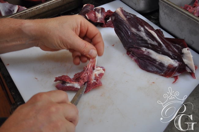 Trimming-Venison-Fat-Cerino canning venison