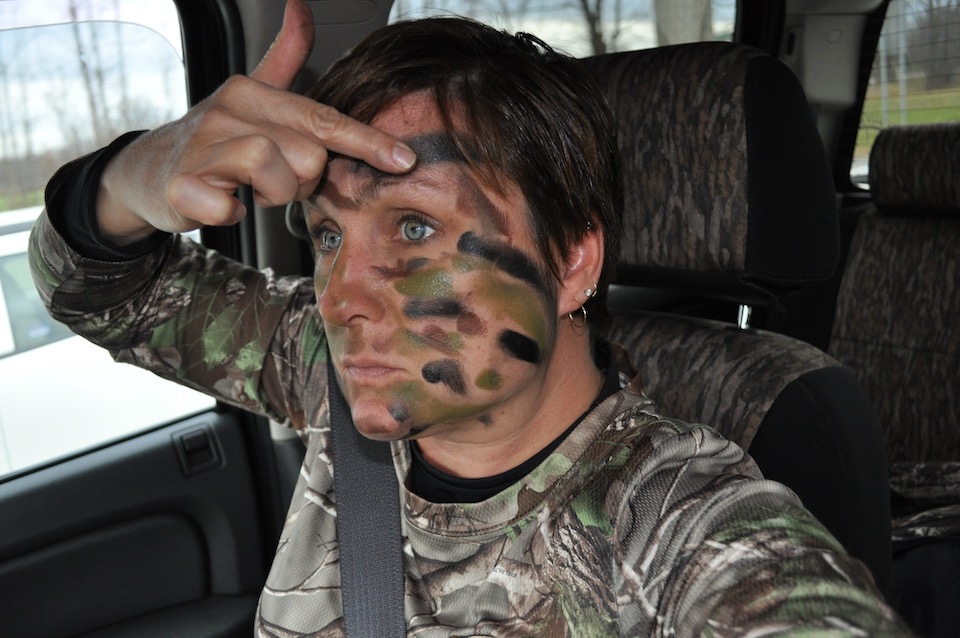 Applying-camo-facepaint